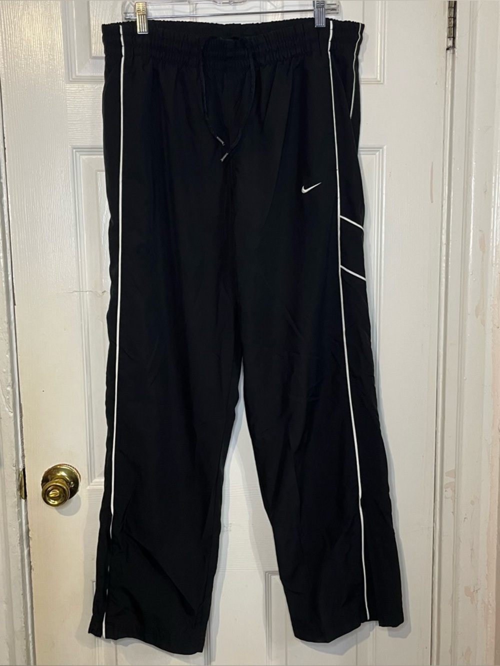 Large black nike track pants for men